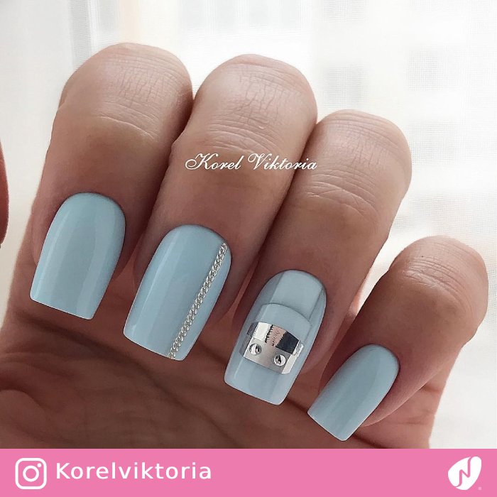 Chrome Robat on Light Blue Nails